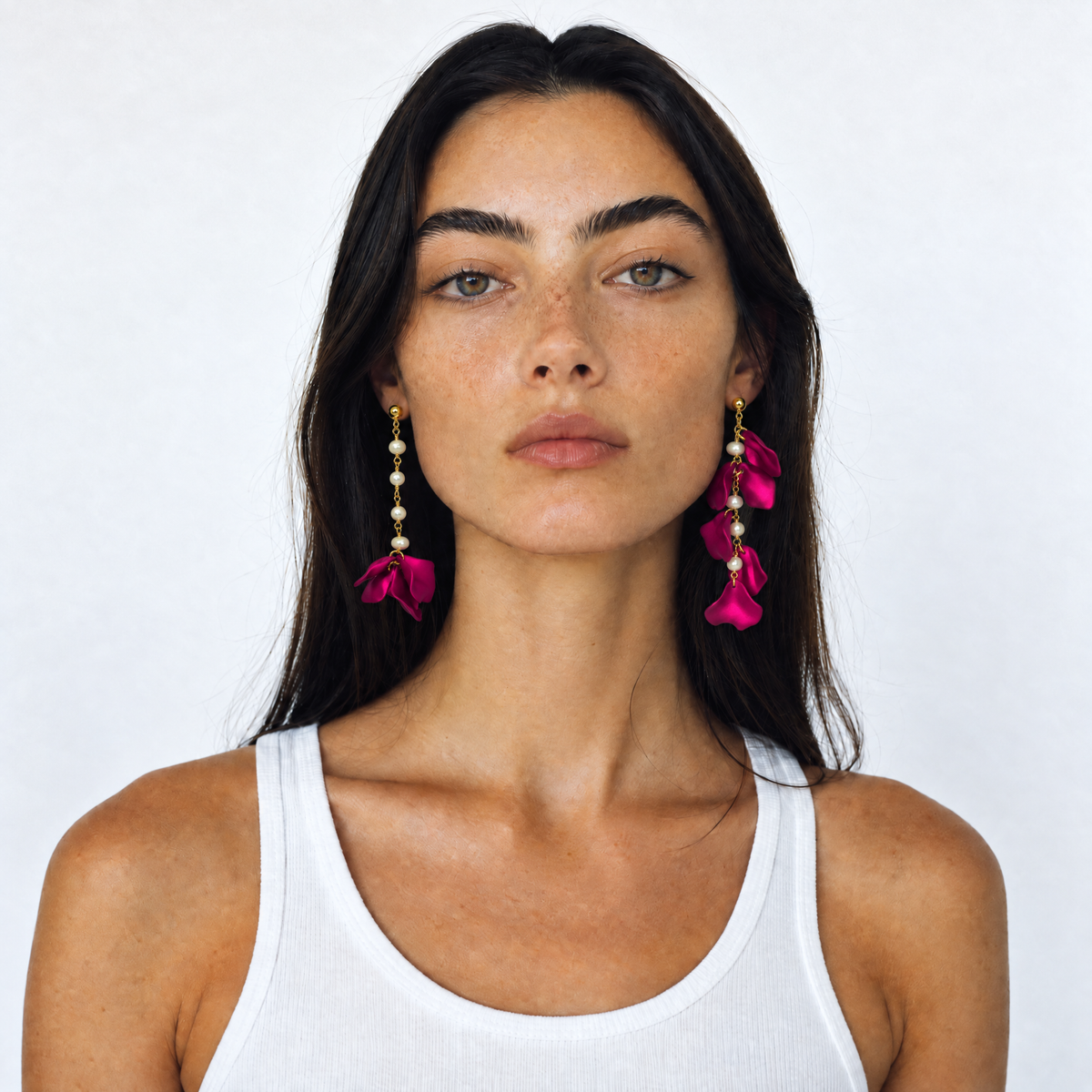 Model wearing Miccy's Rosa Earrings Fuchsia