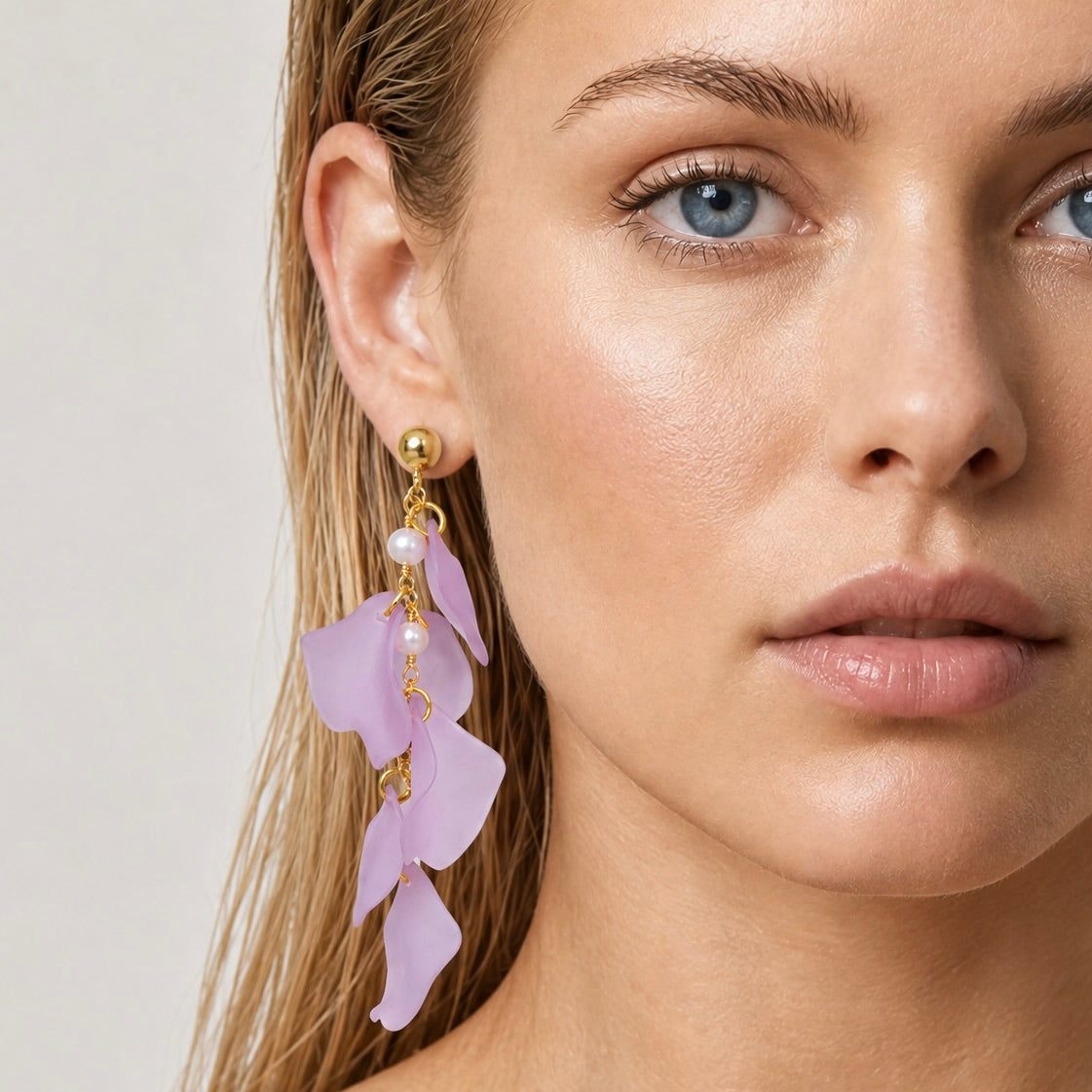 Model wearing Miccy's Rosa Lilac earrings